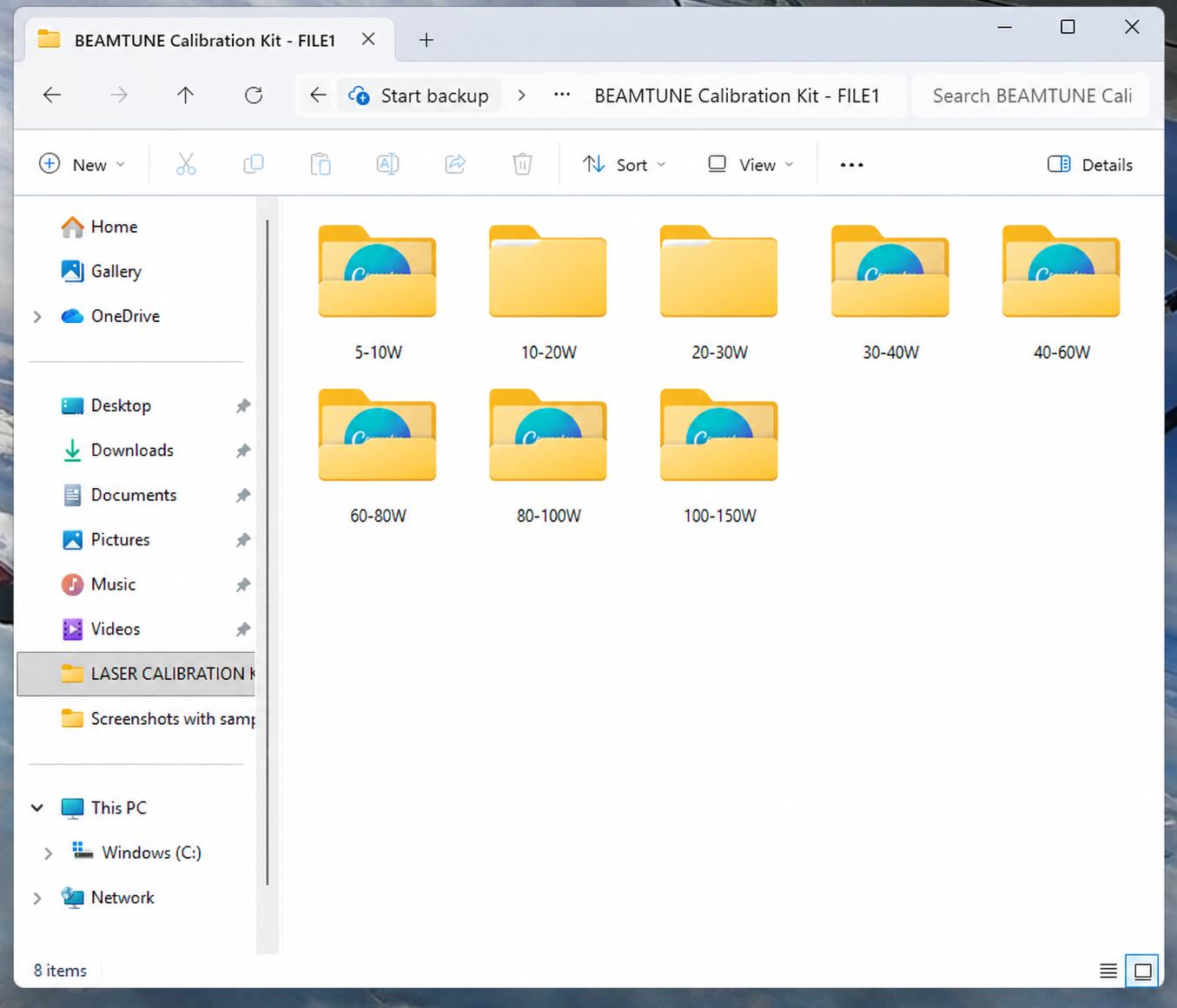 Calibration file folders organized by laser power range
